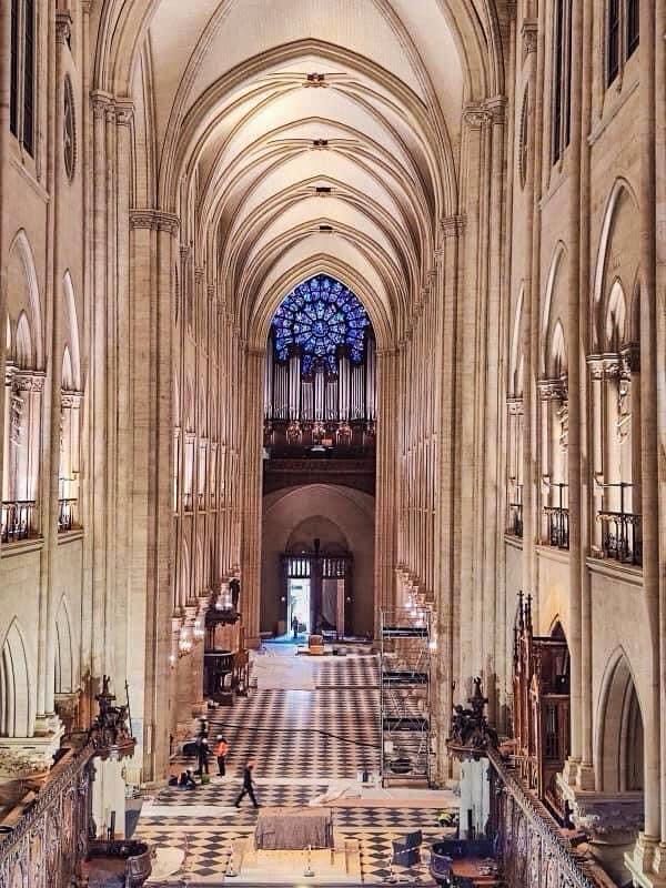Inside Notre Dame Cathedral, Paris a few weeks before it reopens. View from the east to the west end including the Grand Organ.