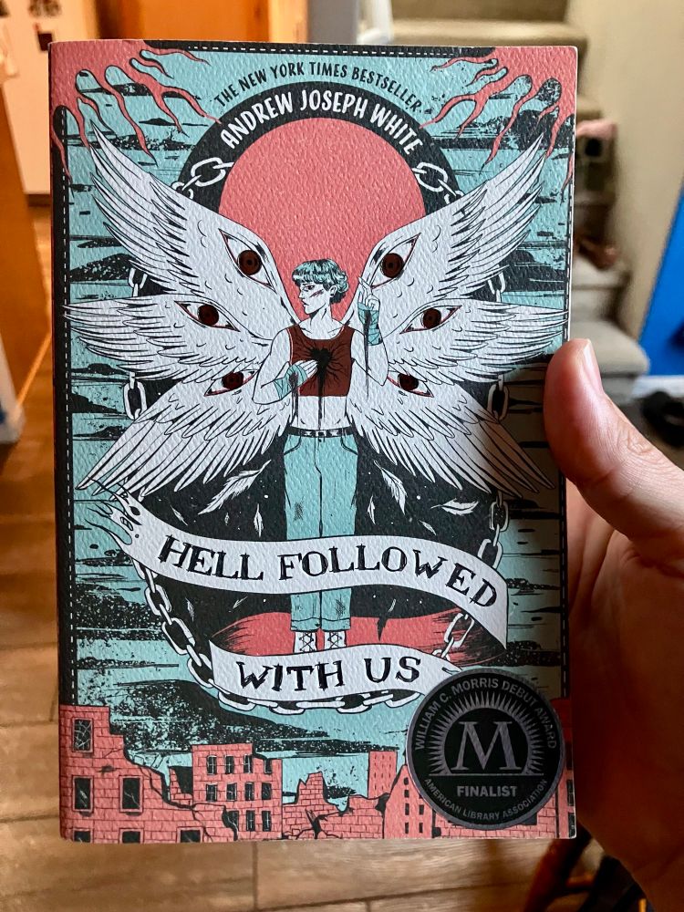Paperback copy of “Hell Followed With Us” by Andrew Joseph White. 