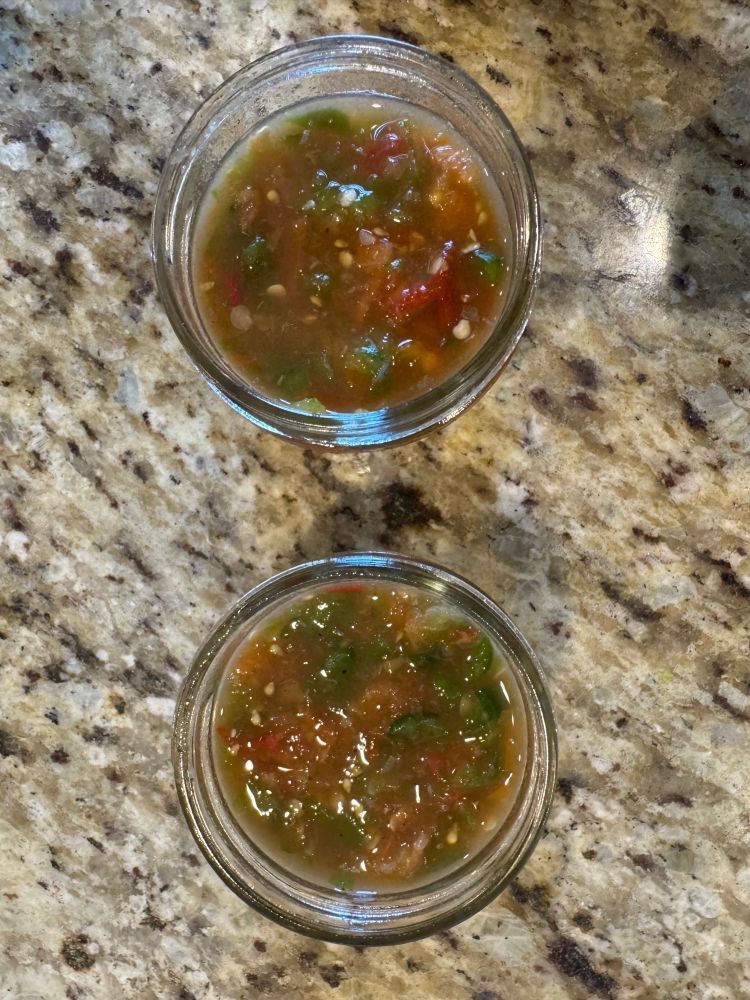 An overhead view of the sauce in jars