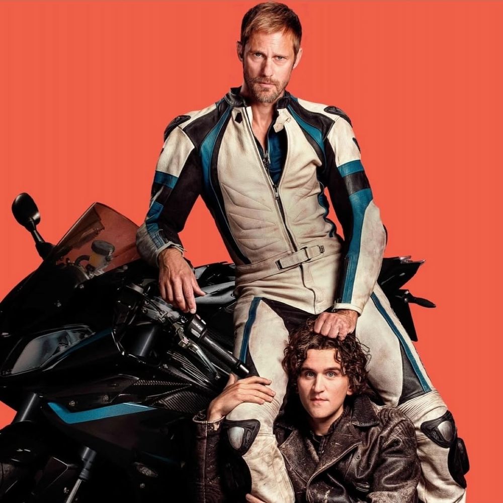 the poster for pillion where leather daddy alexander skarsgard is leaning back against his motorbike sexily. between his legs sits harry melling in an old beat up leather jacket. skarsgard's fist is clenched in melling's short curls, and melling is holding onto skarsgard's thigh. now picture ed as alexander skarsgard and stede in harry melling's place and enjoy 