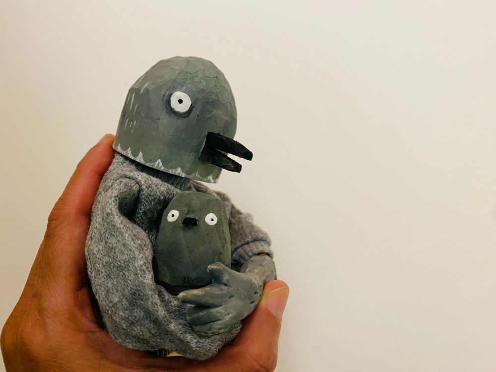 a pigeon puppet, and a lumpy baby bird. 
