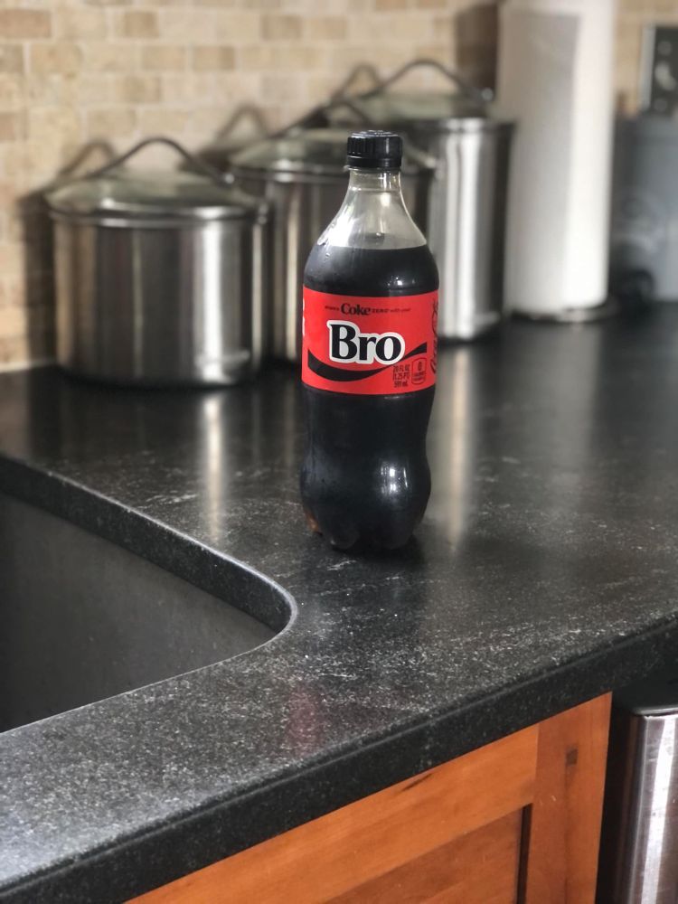 Bottle of Coke Zero soda on a countertop. The vanity label reads "Bro" instead of the varied names the company has been printing on the labels during its "Share a Coke with..." marketing promotion.