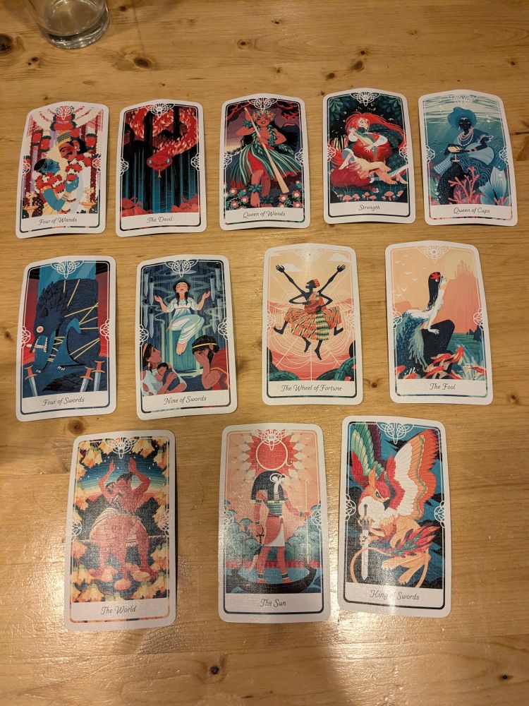 A series of tarot cards with 5 on top, 4 in the center and 3 on the bottom.
