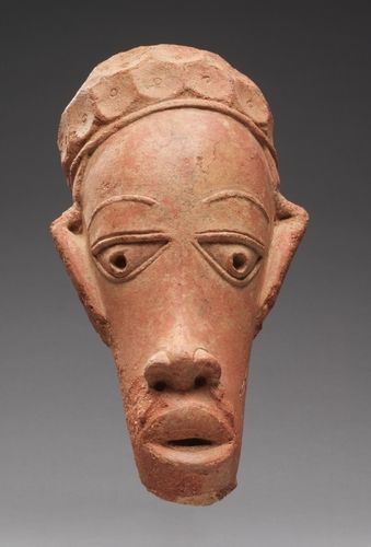Although probably a fragment of a nearly life-size male seated figure, this head is remarkably well preserved. The Nok terracottas may have been part of a shrine or temple or were placed on a tomb. The identities of the portrayed figures remain unknown, but the adornments and elaborate hairstyles and headdresses seem to indicate that they represent notables or leaders.
