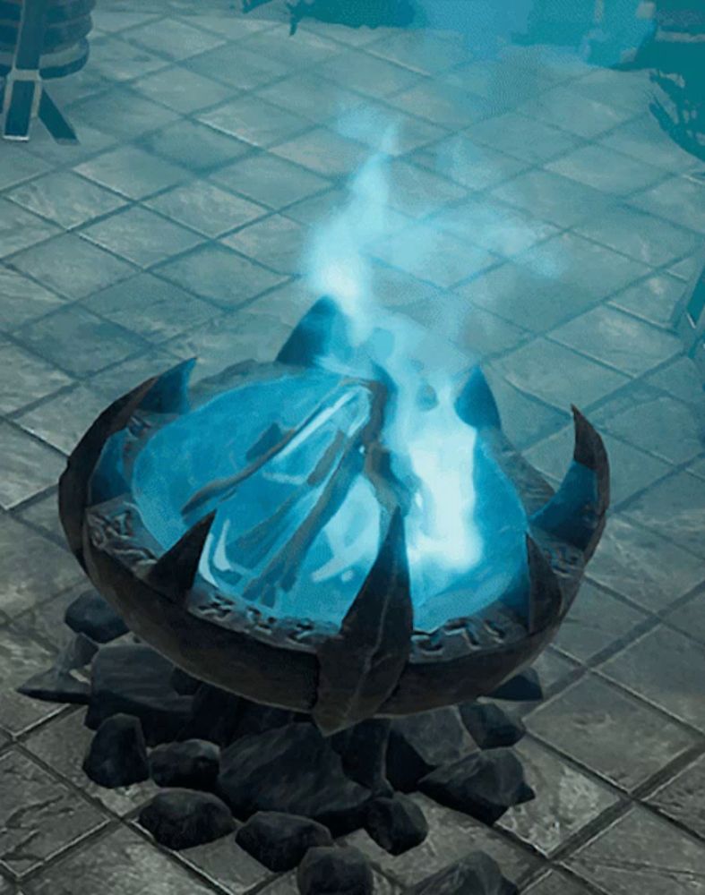 a fire pit with blue flames coming out of it in a dark room