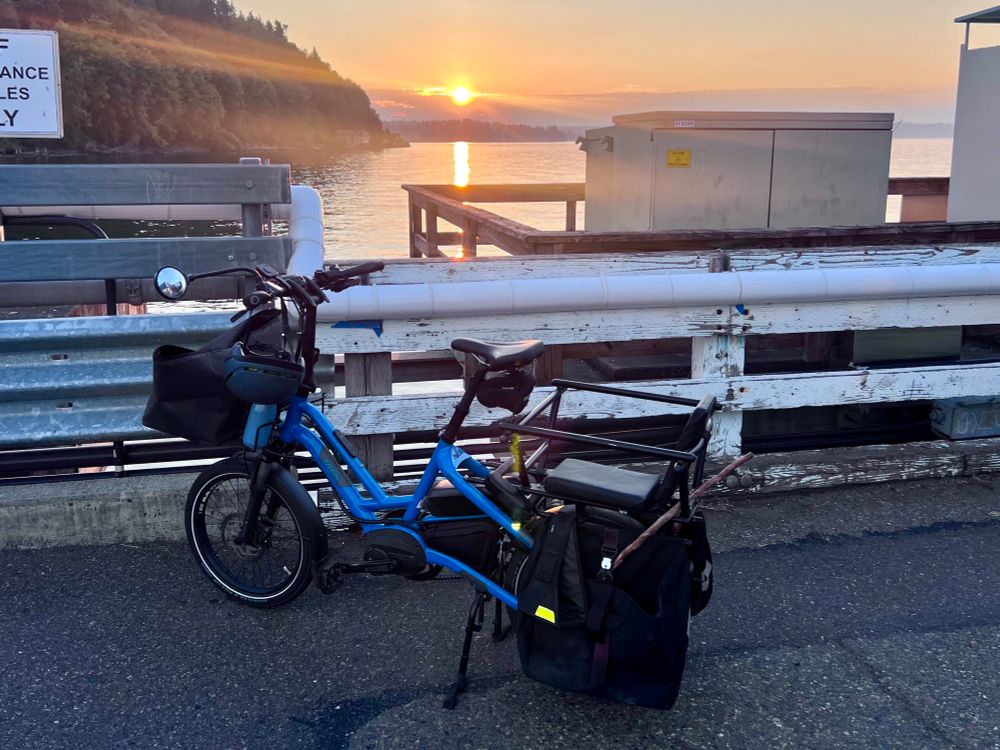 My bike (Tern HSD) back at the Vashon island ferry terminal with the sunset in the background 