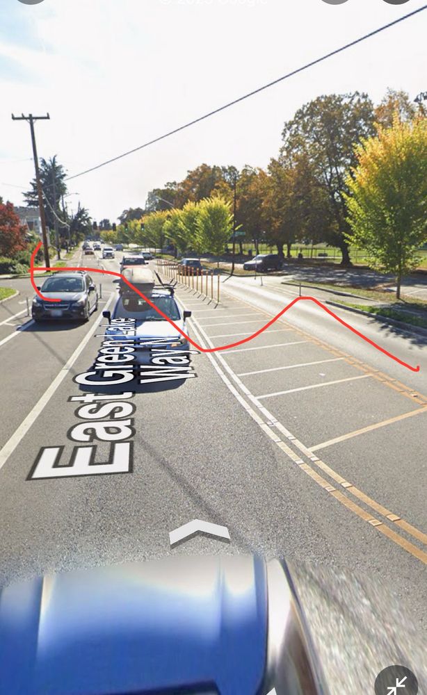 Google map picture showing the driver has to go twice across double yellow lines to go around the diverter 