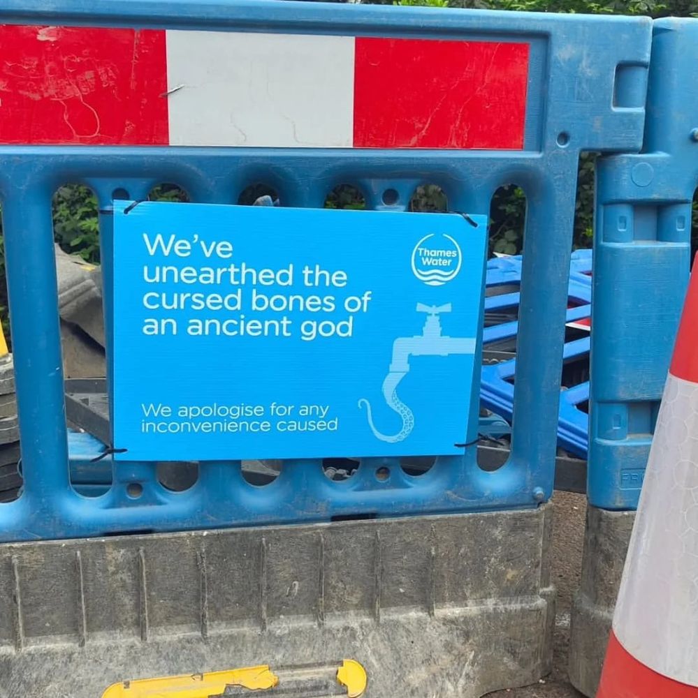 Thames Water sign showing a tap on the right with a tentacle protruding from the spout. On the left is text “We’ve unearthed the cursed bones of an ancient god”