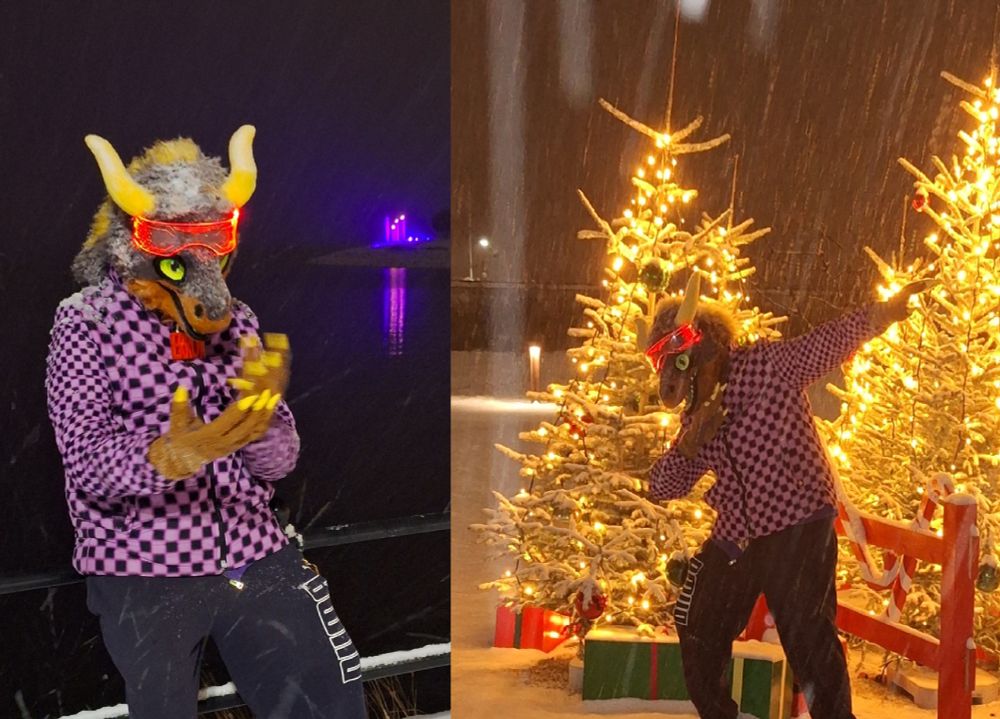 Dragon in the snow, infront of city christmas decorations.