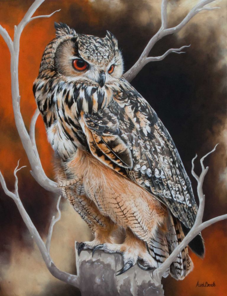 Eagle Owl sitting on a branch