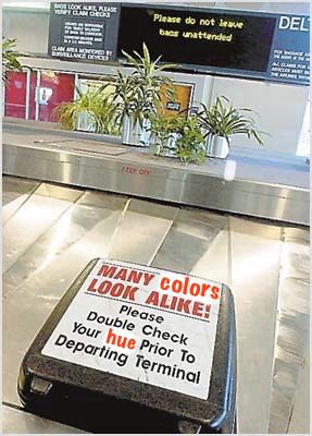 Common airport luggage carousel warning modified to read, “Many colors look alike! Please check your hue prior to departing terminal.”