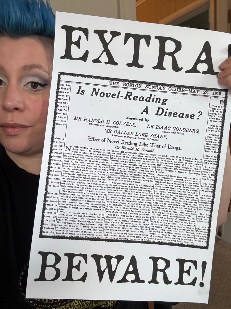 A woman peeks out from behind a black and white print of 1915 Boston Globe article titled “Is Novel Reading a Disease?”, with the word “EXTRA” in large print above and “BEWARE!” In large print below. 