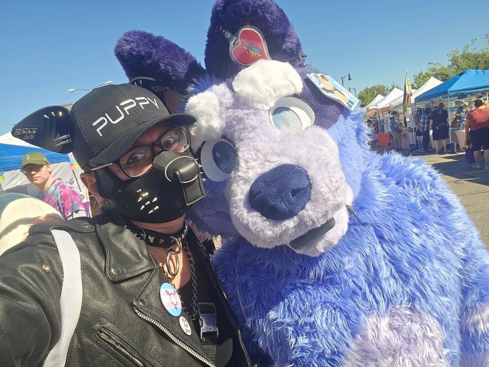 Me posing with our local Socks from Bluey fursuiter