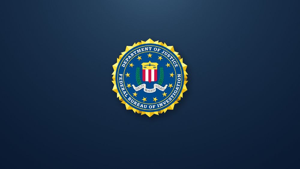 FBI agents this morning arrested a Dayton man who is charged with making an interstate communication with a threat to injure.