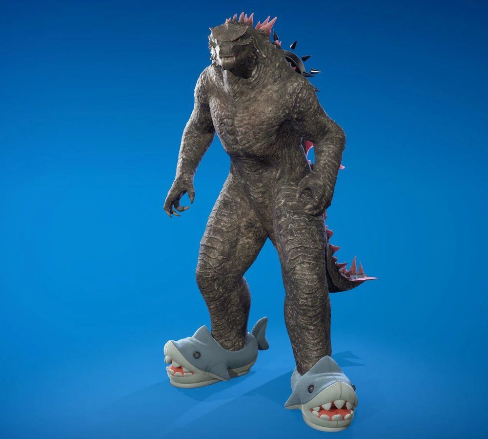 It is a CGI image of Godzilla from the game Fortnite, wearing adorable shark slippers.