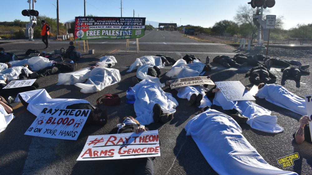 Die-In at Raytheon Compound in Tucson Calls Out Complicity in Gaza - UNICORN RIOT