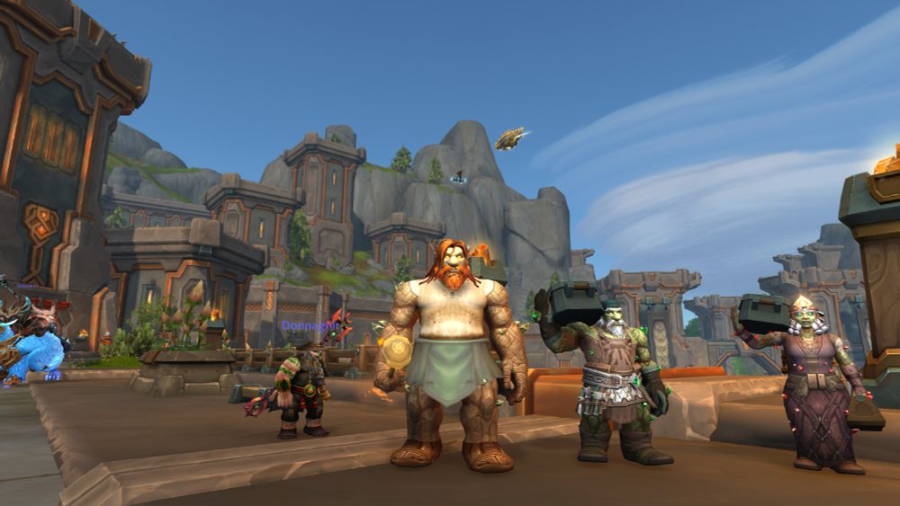 A dwarf dwarfs his fellow earthen with two types of firewater recently imbibed.