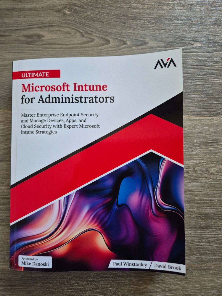 A picture of a book, showing just the cover. The book is called Ultimate Microsoft Intune for Administrators by Paul Winstanley and David Brook.