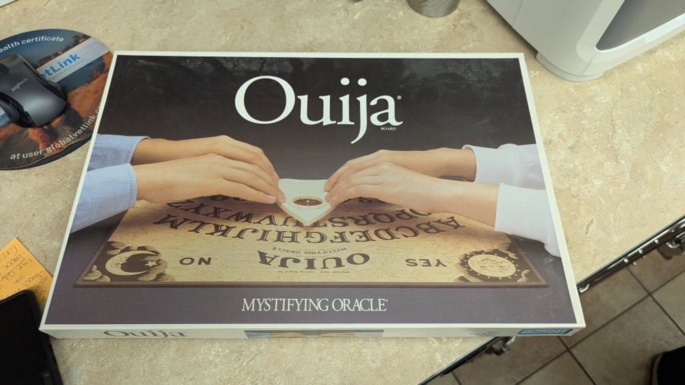 A ouija board in a box. The box is intact and in good shape. It looks vintage, from the early 90's.