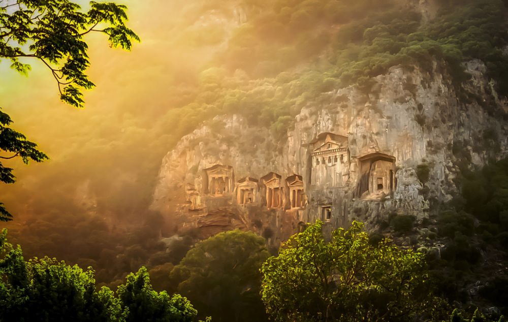 The ancient rock tombs of Dalyan illuminated by sunset light. 