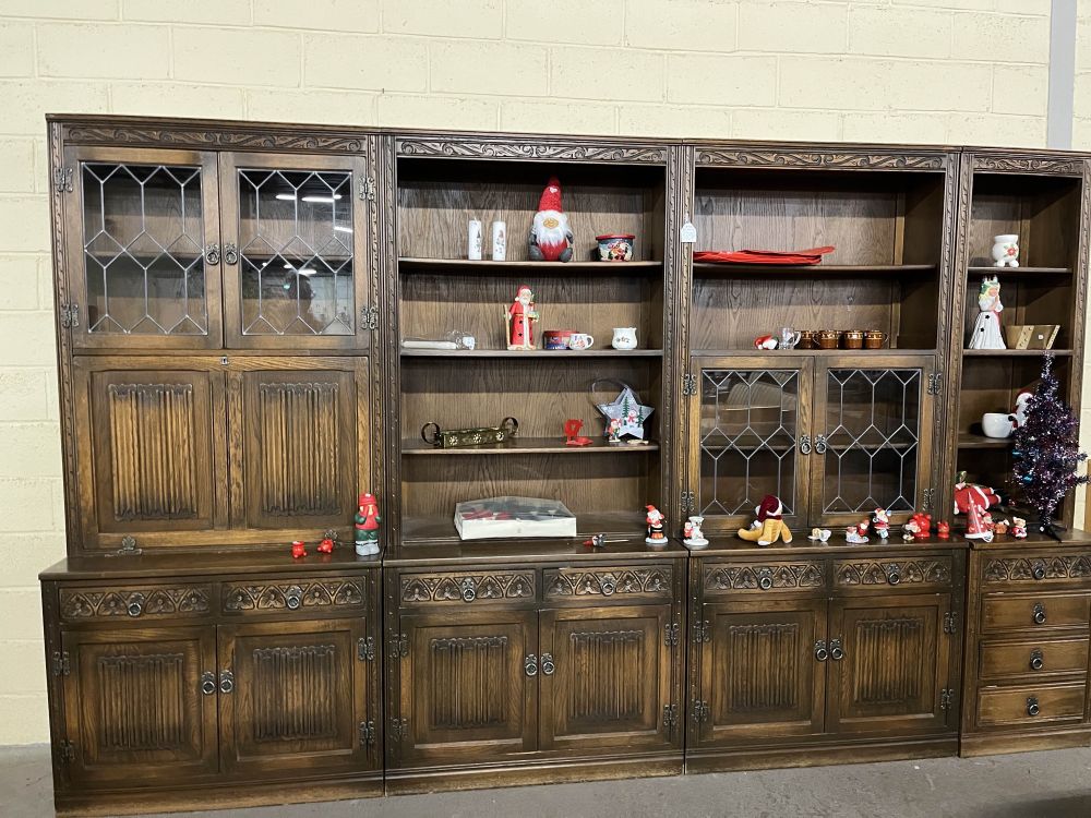 Solid oak antique cabinet covered in Santas