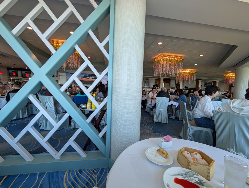 Some of the family-friendly scene on the first floor. There's also a second floor, a bar, a few private rooms, and at least one room of tables that doesn't have a bay view.