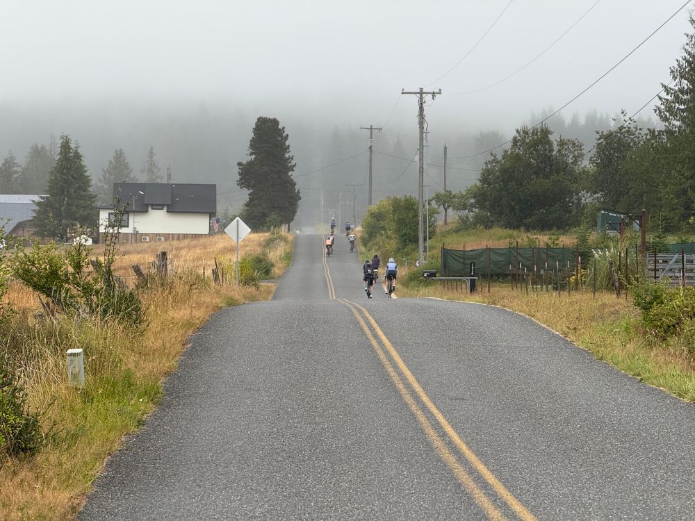 Bikes on road with low clouds