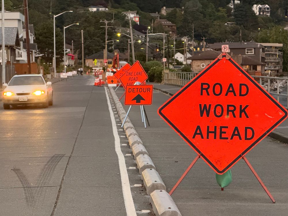 Huge signs placed in walk/roll space 