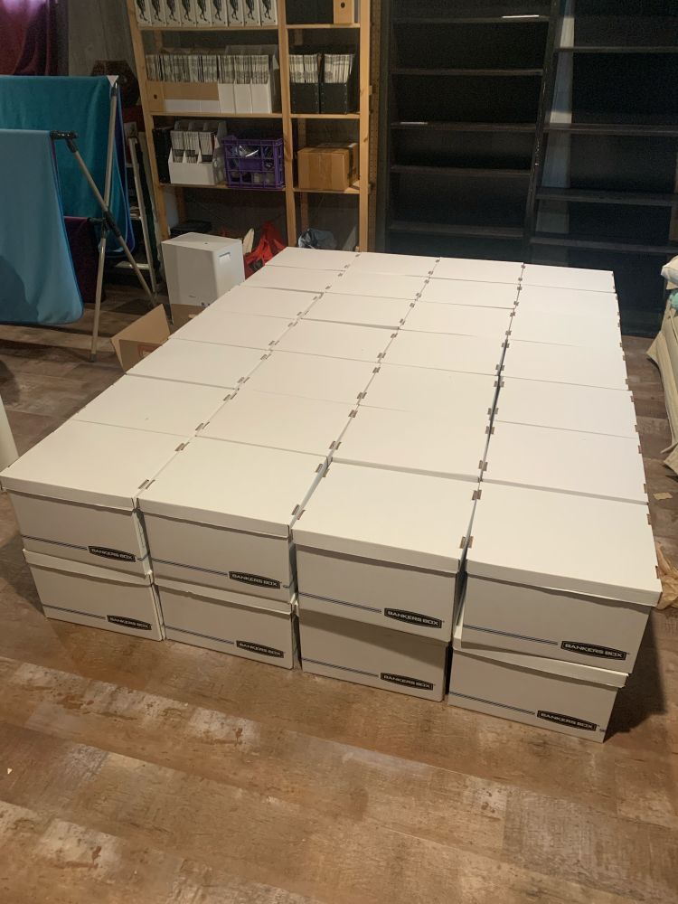 The 56 bankers boxes that hold the plurality of my library.