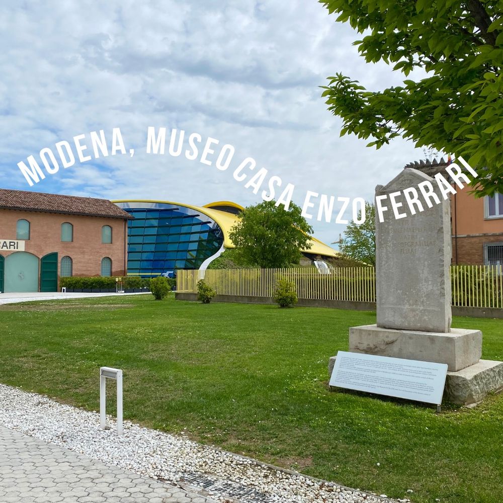 Enzo Ferrari museum, brick building and swoopy building with blue glass and yellow roof, Roman stele, Modena