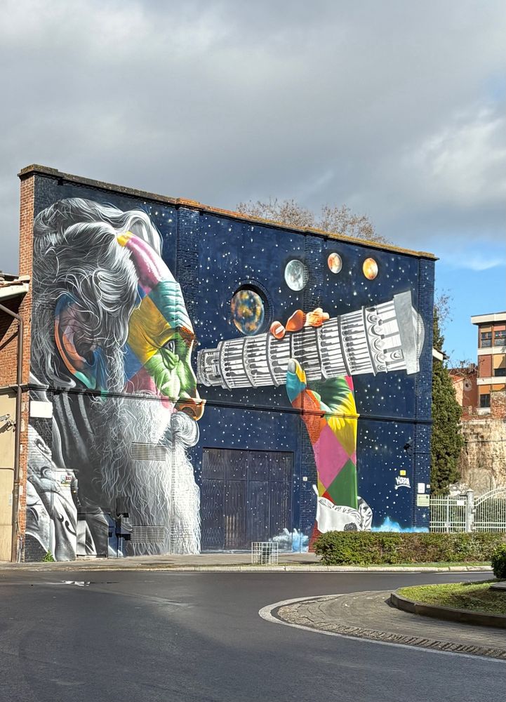 A mural with Galileo using the leaning tower as a telescope 