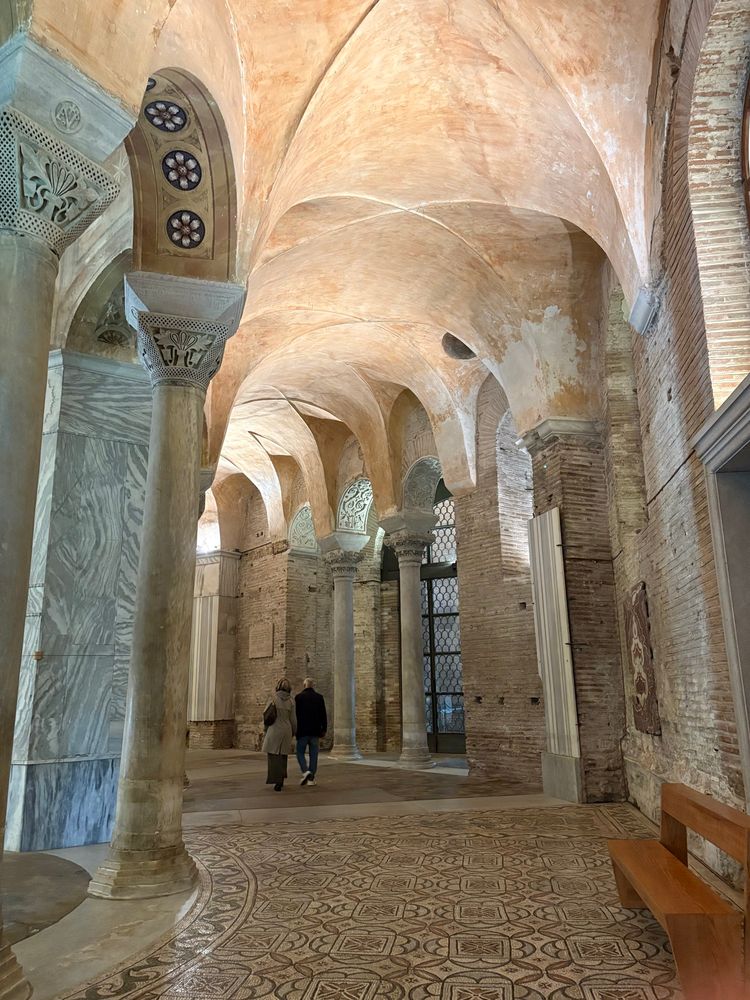 Interior of San Vitale, arches, mosaics on the floor