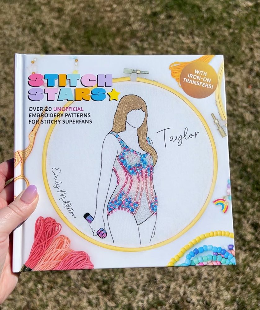 Cover of ‘Stitch Stars: Taylor’ by Emily Middleton, a Taylor Swift embroidery book with Taylor wearing the Lover bodysuit on the cover 