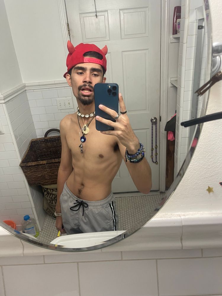 robyn wearing a red demon hat