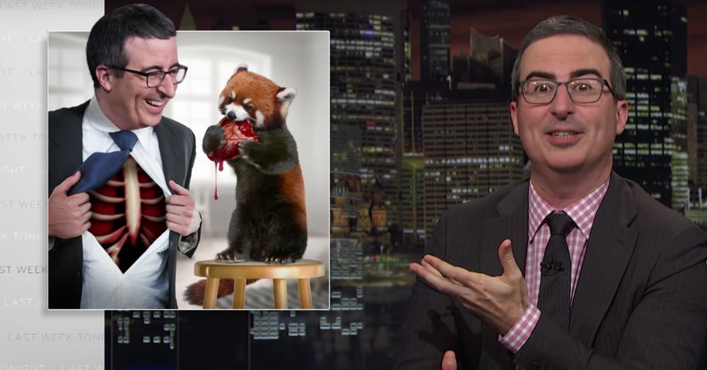 John Oliver of "Last Week Tonight with John Oliver" gesturing to a screen graphic of a smiling John Oliver opening his shirt and chest to allow a red panda to eat his heart.