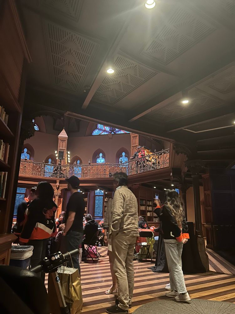 The line of people waiting to be served a nonalcoholic drink at the Orange and Black Oasis.