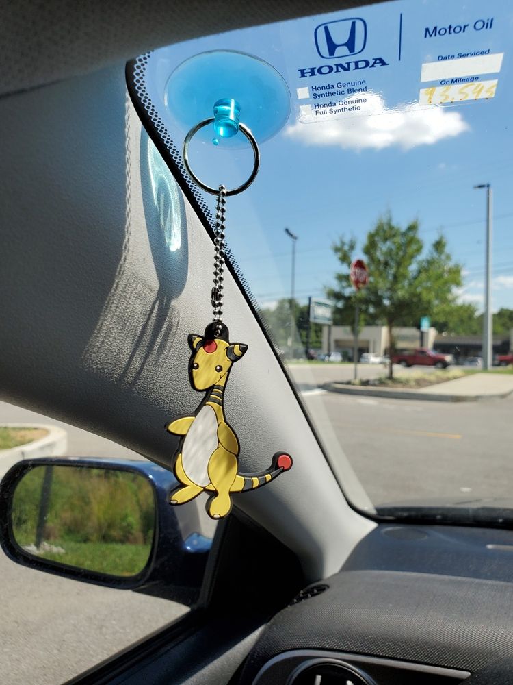 ampharos keychain hanging from windshield