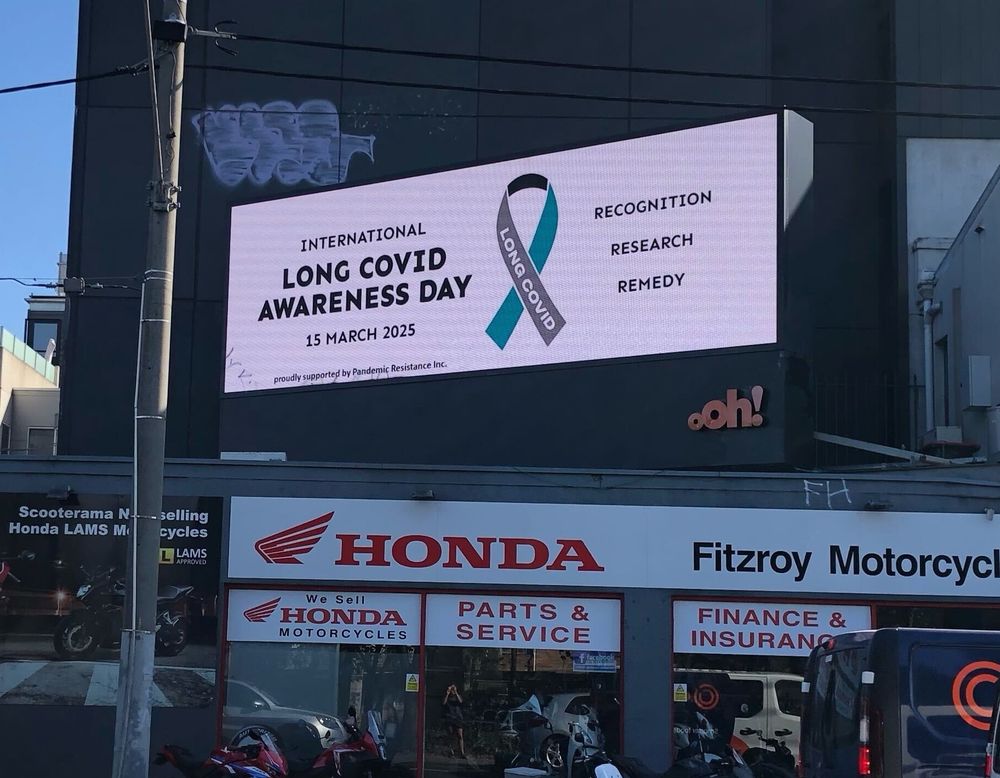 Long Covid Awareness Day Billboard.

Text: International Long COVID Awareness Day
15th March 2025
Recognition, research, remedy.

White background, black text with image of Long COVID Awareness Day ribbon.