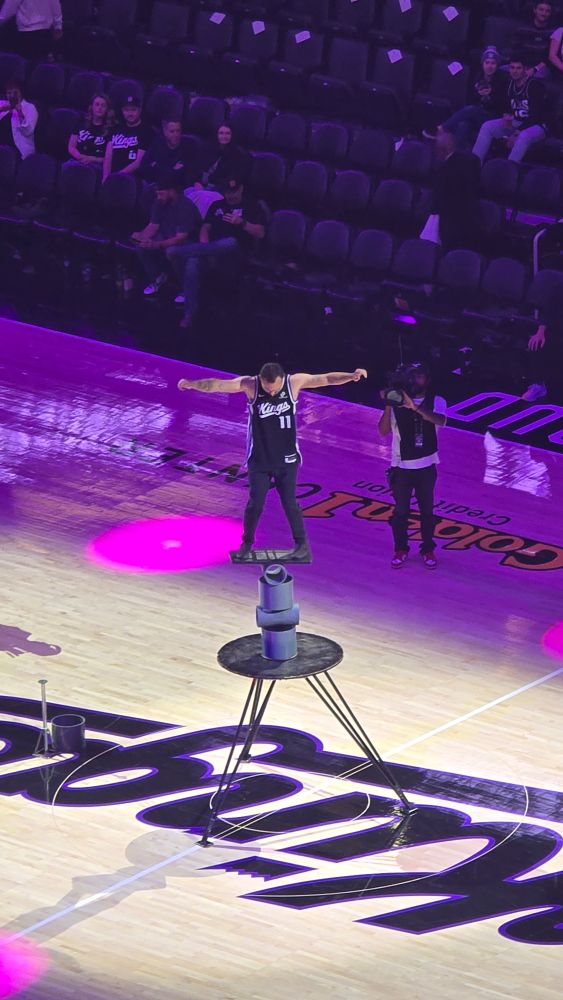 Guy balancing on some cylinders