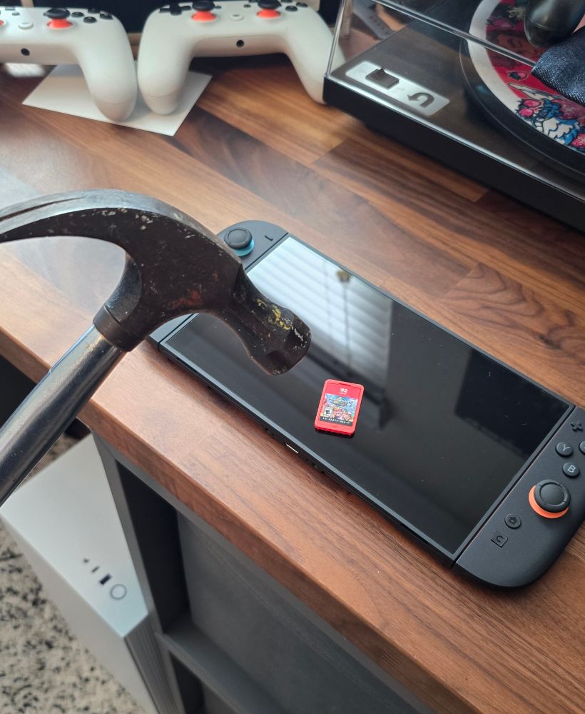 Mario Kart World ln the Switch 2 being broken by a speedrunner (with a hammer)