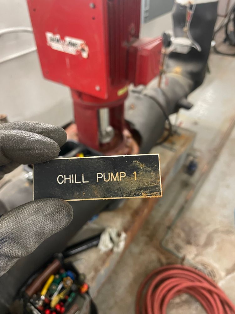 Label from a chilled water pump that says “CHILL PUMP 1”