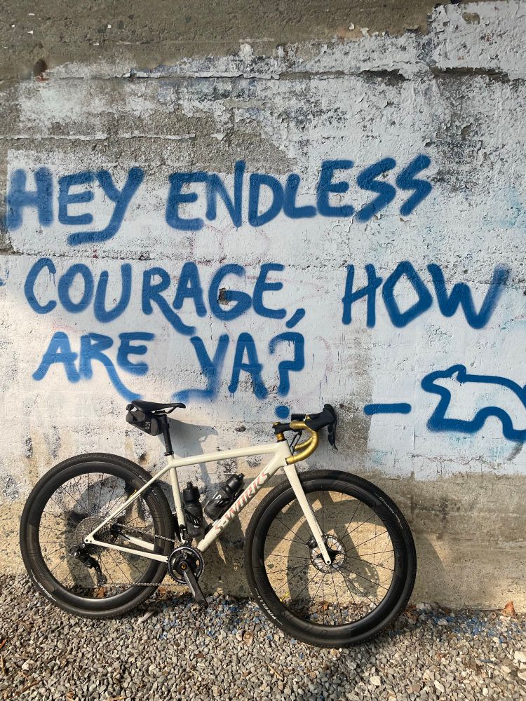 Graffiti that reads “hey endless courage, how are ya?” 
