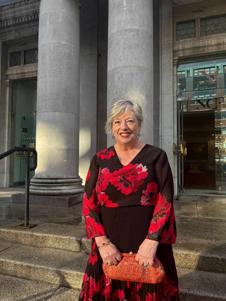 Vona Groarke standing on the steps of the National Concert Hall, Dublin