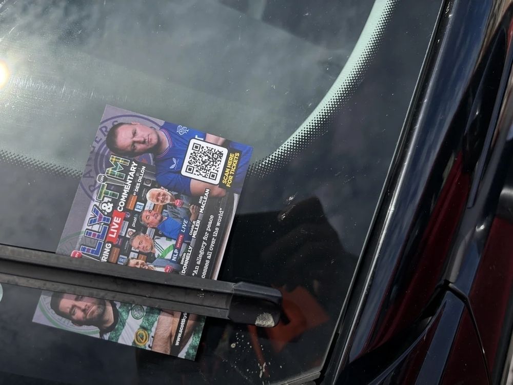 Flyers for Billy & Tim stuck under someone's windscreen. This is frowned on. 