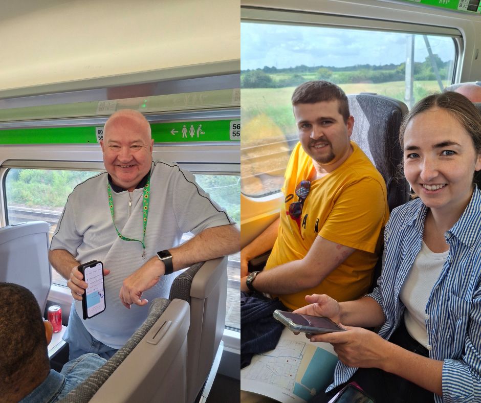 People stood or sat together on a train as passengers