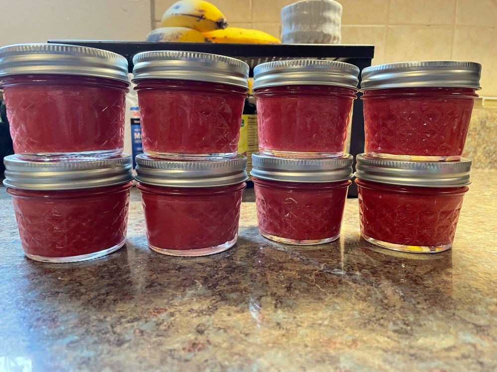 8 small jars of pretty pink cranberry curd 