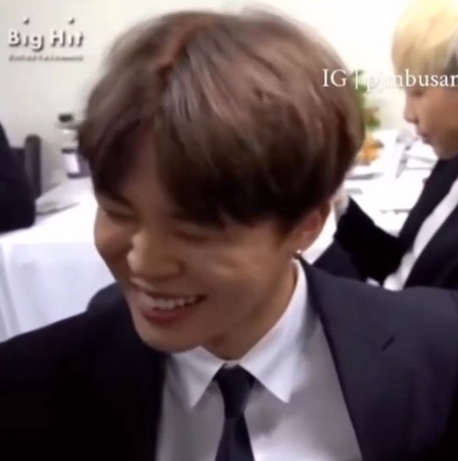 Jimin smiling while being goofy with Jin. The dimples he gets at the tops of his cheeks when he smiles are extra dimpley. The Joof is also making an appearance.