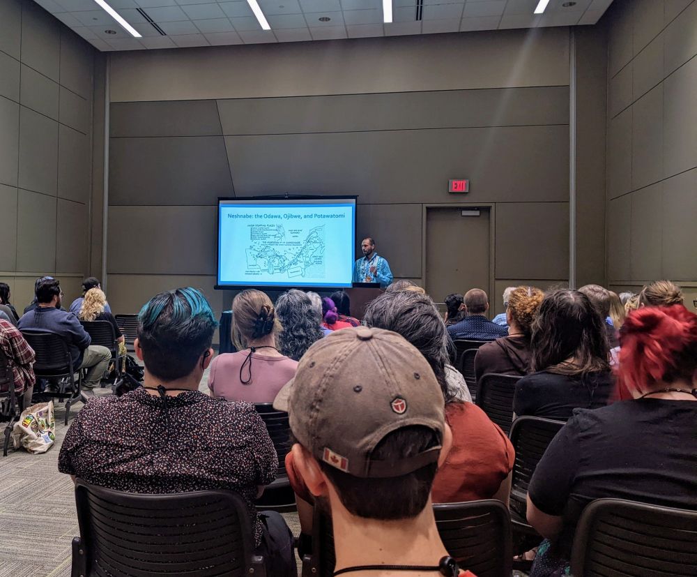 Audience listening to Kaya DeerinWater.