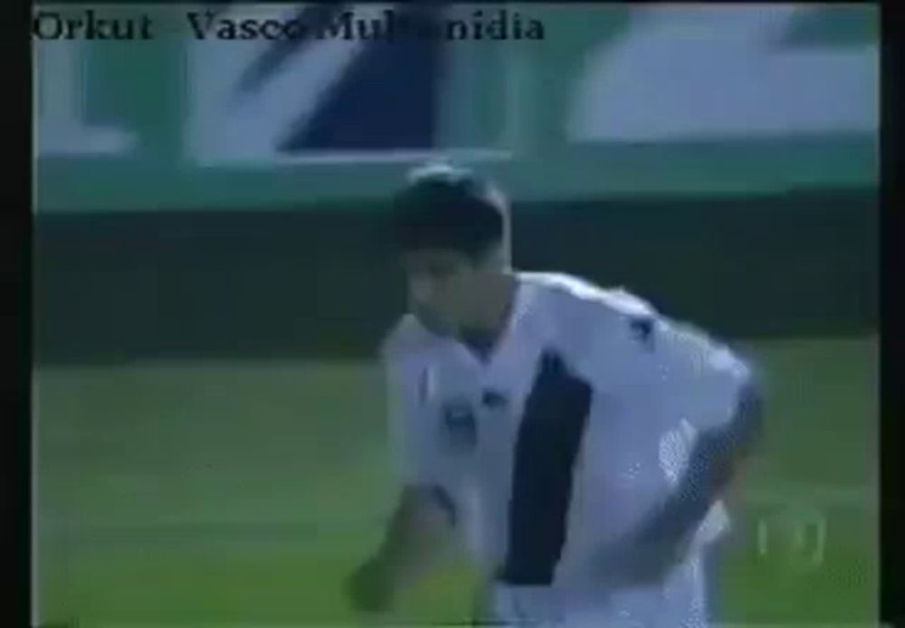 a group of people are playing soccer on a field with a sign in the background that says ' ara ' .