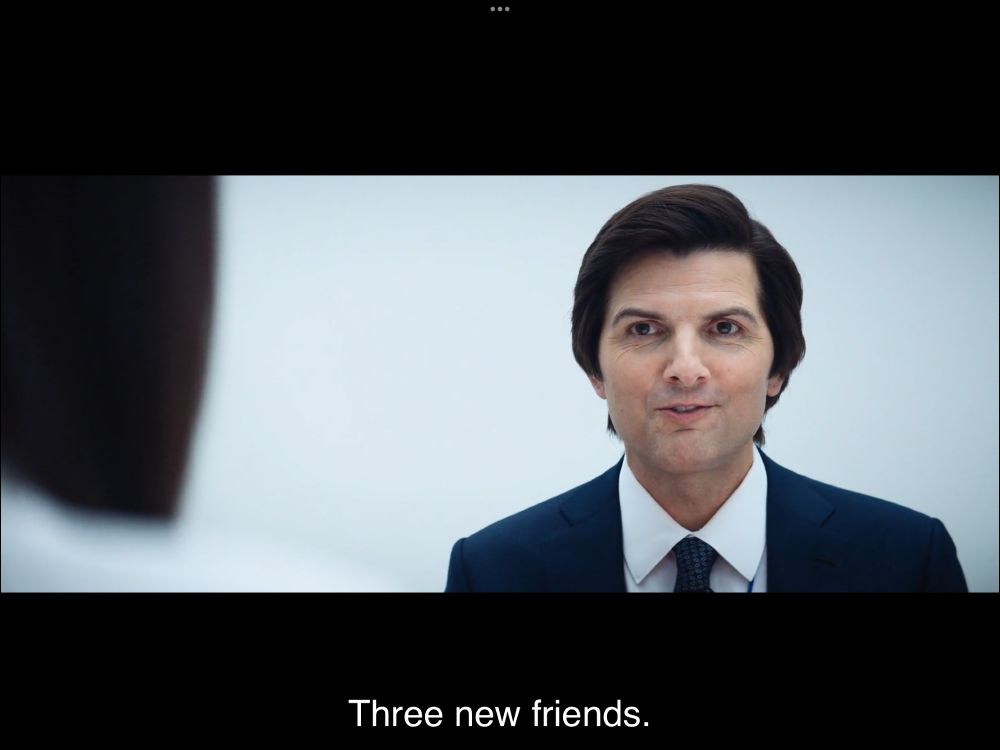 screencap from same Severance scene as the quote skeet. Mark S is saying ‘Three new friends’ (closed captioned) after scrounging up the most laboured smile